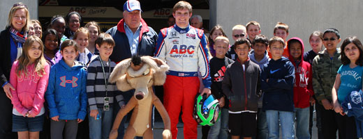 Conor Daly and AJ Foyt with students