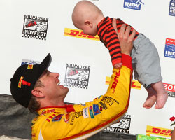 Ryan and Ryden celebrate in Victory Circle