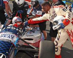 Herschel Walker fist-bumps with Mario Andretti