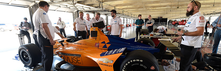 McLaren crew with car Texas