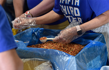 Fifth Third employees packing meals