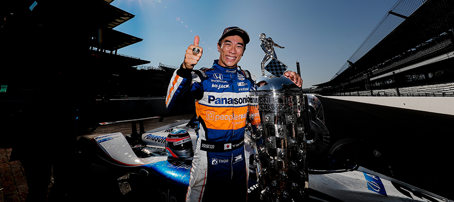Takuma Sato with the Borg-Warner Trophy
