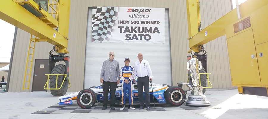 Takuma Sato, Mike Lanigan and Bobby Rahal at Mi-Jack headquarters