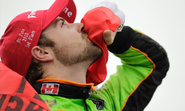 Hinchcliffe Kisses Canadian Flag in Victory Lane
