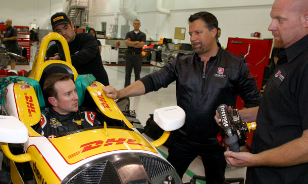 Kurt Busch with Michael Andretti during seat fit