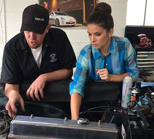 In the blog: Lauren Bohlander gets a little help from husband Tony Kanaan during filming of 'Garage Squad'