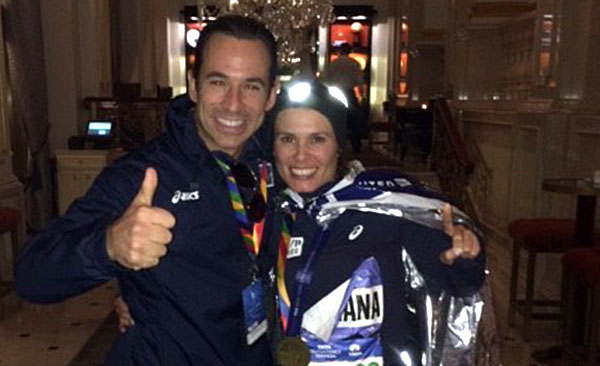 Helio Castroneves, left, and his partner Adriana Henao celebrate her successful completion of the New York City Marathon on Nov. 2.
