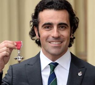 Duke of Cambridge presents Dario Franchitti MBE medal for contributions to motorsports
