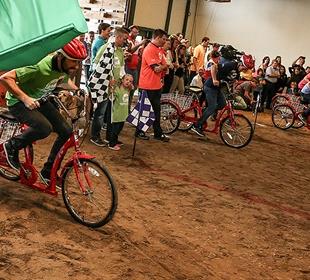 Drivers enjoy tricycle fun and time with TherAplay children