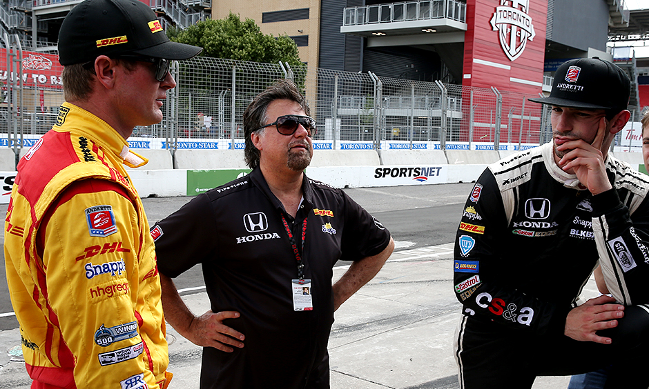 Team owner Michael Andretti talks with Ryan Hunter-Reay and Alexander Rossi.