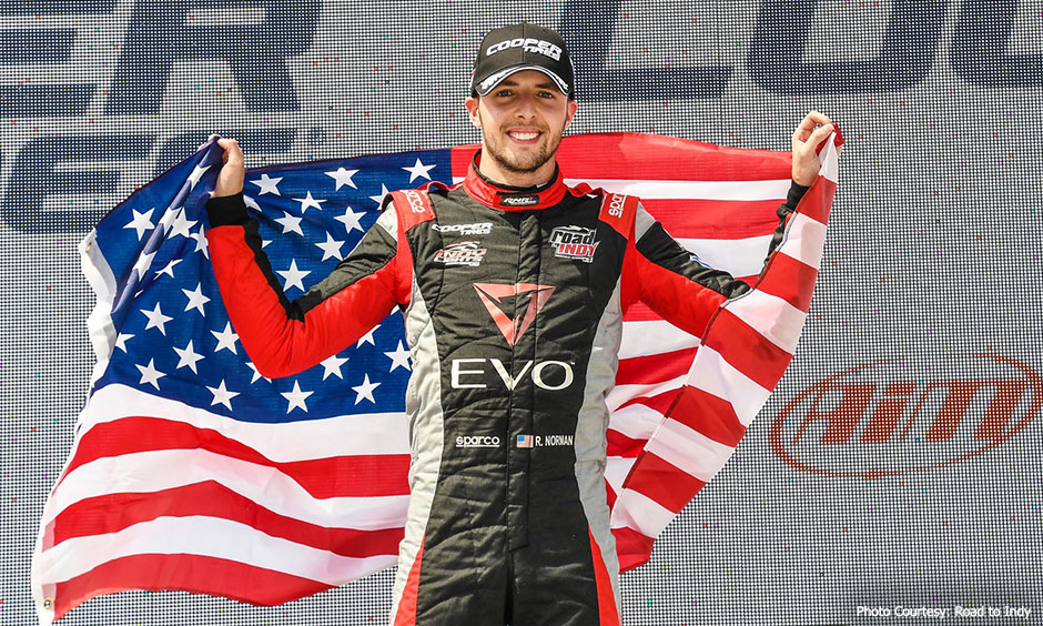 Ryan Norman with U.S. flag at Road America