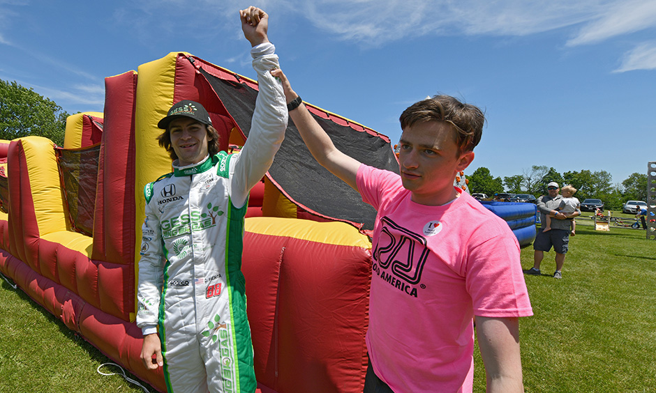 Colton Herta and George Steinbrenner IV at Road America family fun zone