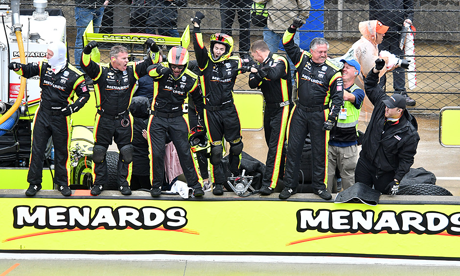 Simon Pagenaud's crew celebrates his 2019 win in the INDYCAR Grand Prix.